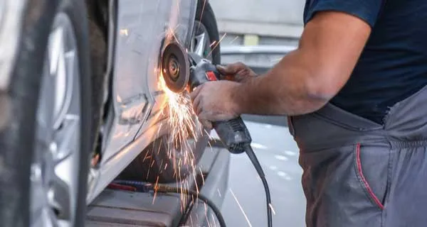 Aluminum vehicle body panel undergoing repair