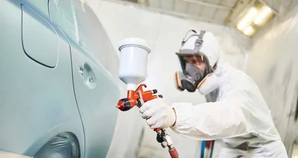 Vehicle being refinished in the RX Collision in-house paint booth